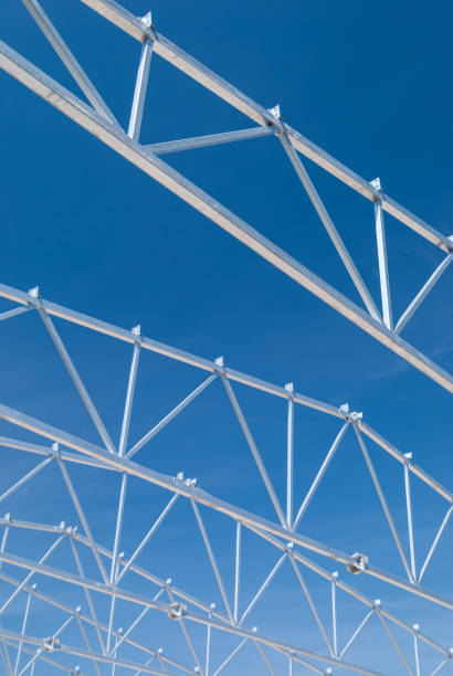 istock Galvanized steel roof truss construction frames 868618590