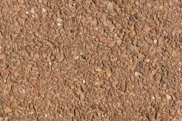 istock Stone wall background - concrete with granite gravel 868623700