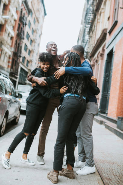 istock Friends Greeting Each Other in New York 868626618