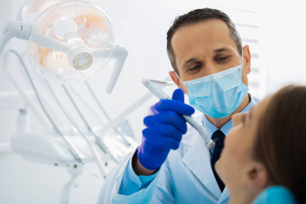 istock Positive delighted dentist wear a mask 868626798