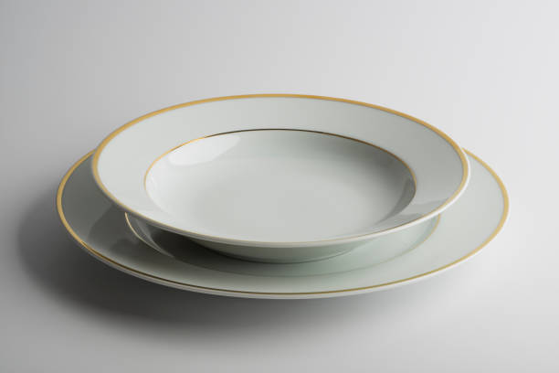 istock Plate and bowl decorated with gold thread on the edge 868626948