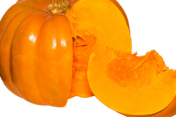 Slice of ripe orange pumpkin on a white background.
