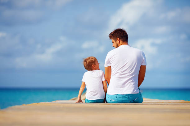 Dad holding his son