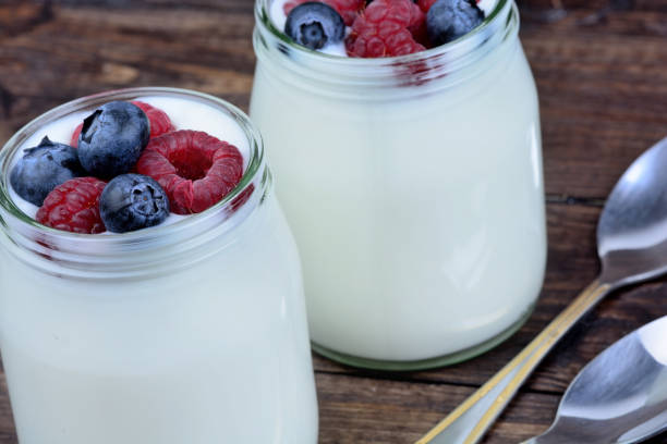istock Yogurt with berries in a jars glass 868639188