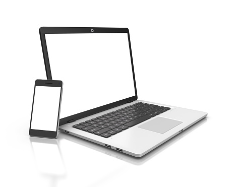 Moderno ordenador portátil y smartphone aislado en blanco. photo