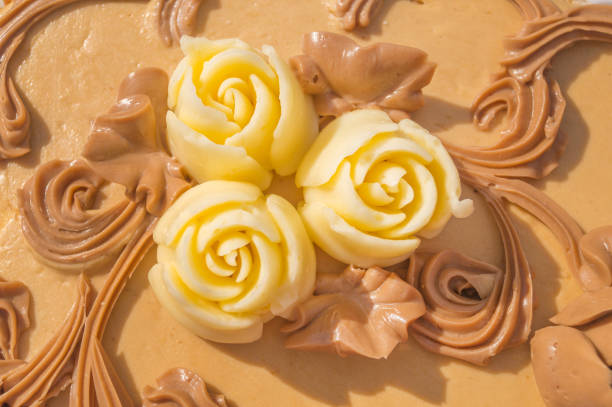 istock Decoration in the form of a rose on a cake. Top view 868646772