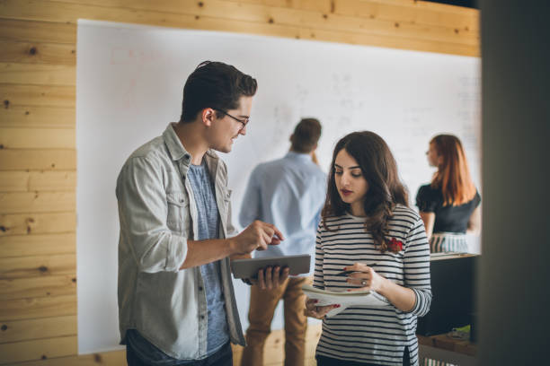 istock Group of designers brainstorming 868647594