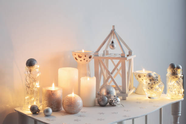 istock home Christmas decoration with candles on background  white wall 868651070
