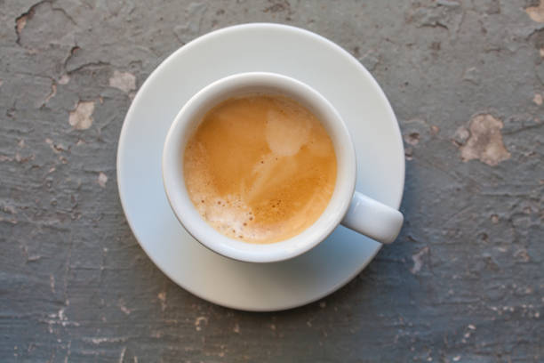 istock Cup of coffee esspresso, top view on grey grunge background 868652116