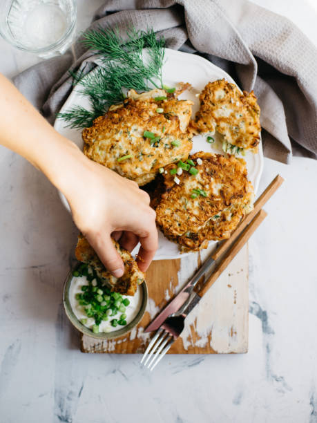 istock Vegetable pancakes with sour cream 868652620