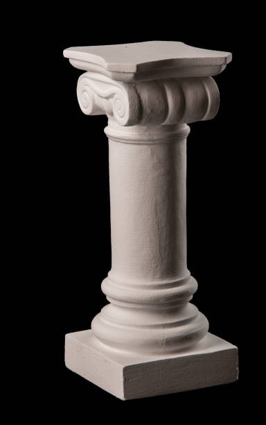 istock plaster graceful decorations on the columns on a black background 868658918