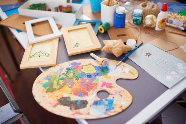 istock Dirty palette on designers desk 868659162