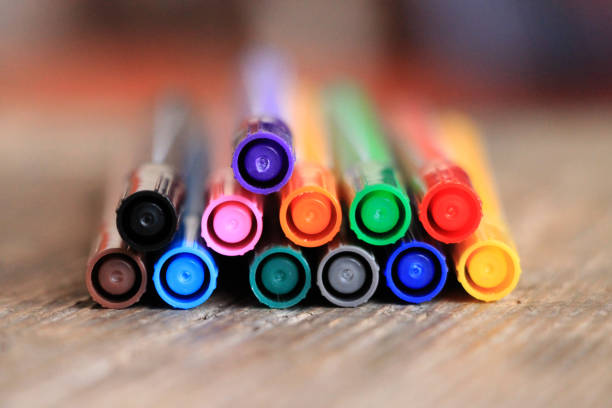 istock Colorful markers on wooden table 868659846