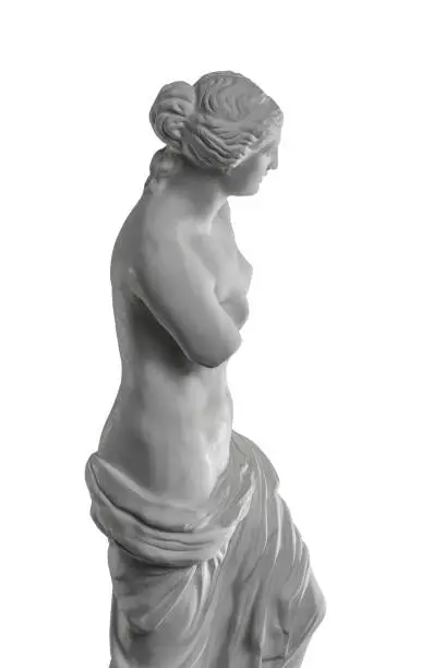 Photo of plaster sculpture of Venus on a white background, gypsum