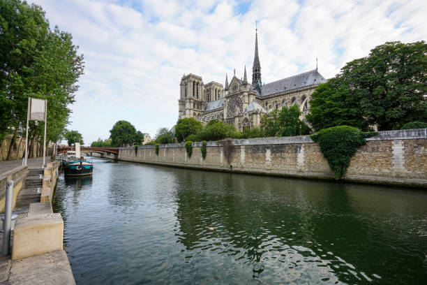 istock The Notre-Dame cathedral Paris at Seine river 868662106