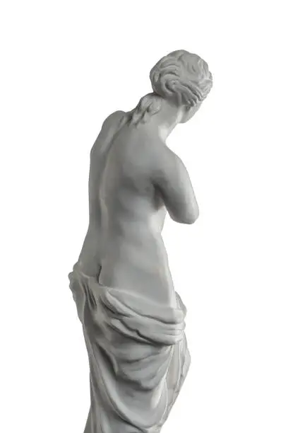 Photo of plaster sculpture of Venus on a white background, gypsum