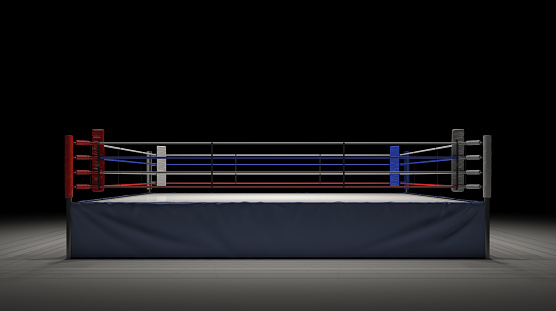 3d rendering of an empty boxing ring in front view spotlighted in the dark. Boxing and fighting sports. Professional fighting. Sparring and competition.