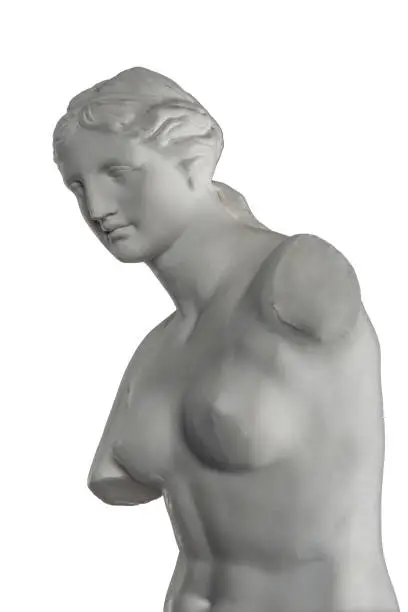 Photo of plaster sculpture of Venus on a white background, gypsum