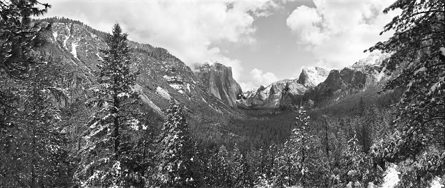 Black and white panorama of Yosemite National Park in winter.