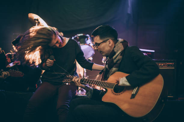 istock Rock band performing in the club 868670490