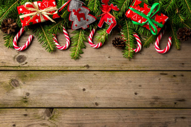istock Christmas background with colorful gift boxes, decorations and candy canes with copy space 868671406