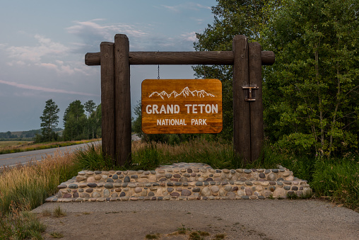 Grand Teton National Park, United States: August 8th, 2017: Entry Sign on the East Side of Grand Teton National Park
