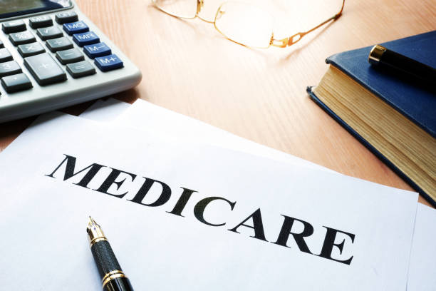 istock Medicare policy on a desk. 868673886