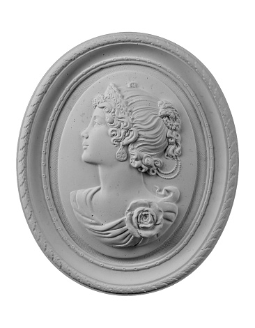 plaster face in a medallion on a white background