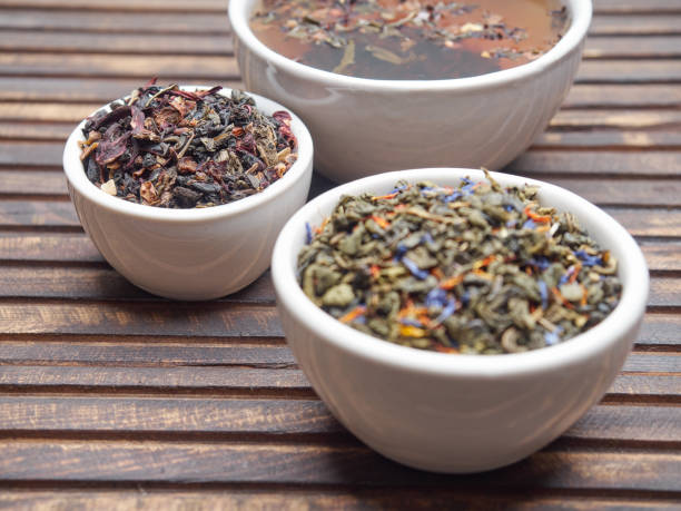istock Tea of different kinds is poured into light cups. 868678760