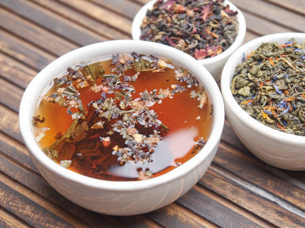 istock Tea of different kinds is poured into light cups. 868678972