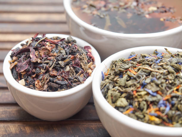 istock Tea of different kinds is poured into light cups. 868679168