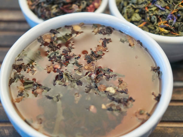 istock Tea of different kinds is poured into light cups. 868679232
