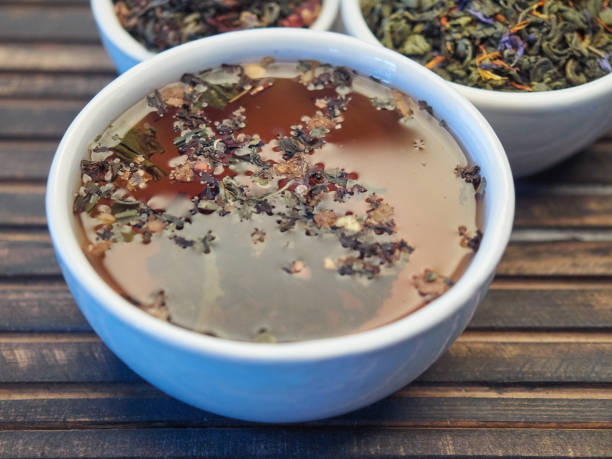 istock Tea of different kinds is poured into light cups. 868679482