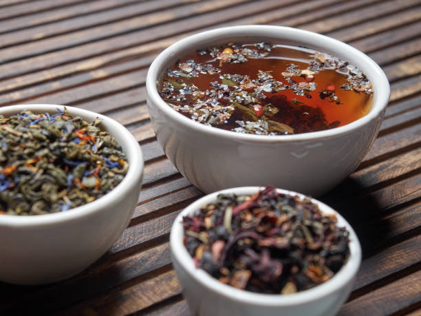 istock Tea of different kinds is poured into light cups. 868679846