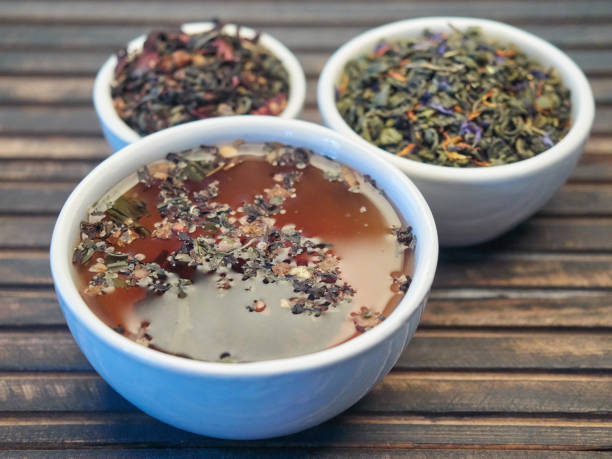 istock Tea of different kinds is poured into light cups. 868684214