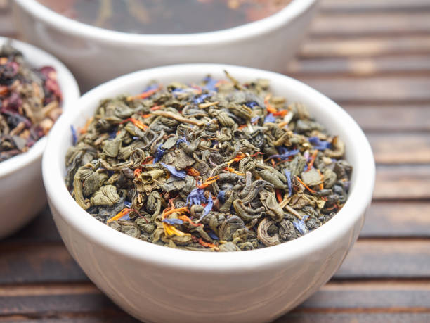 istock Tea of different kinds is poured into light cups. 868685316