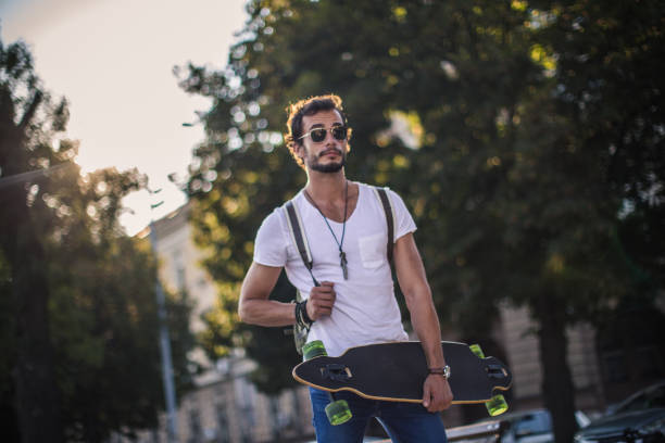 istock Skater man standing on the street 868685376