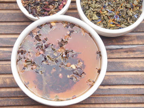 istock Tea of different kinds is poured into light cups. 868685578