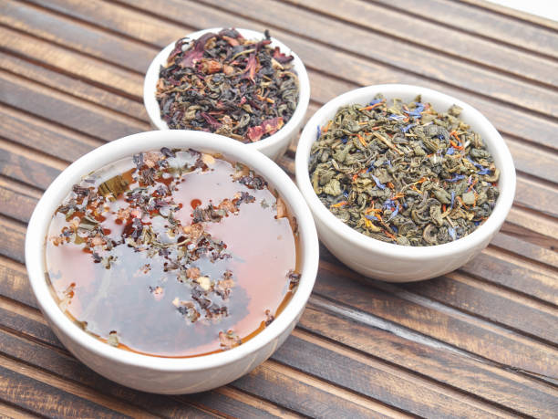 istock Tea of different kinds is poured into light cups. 868685672