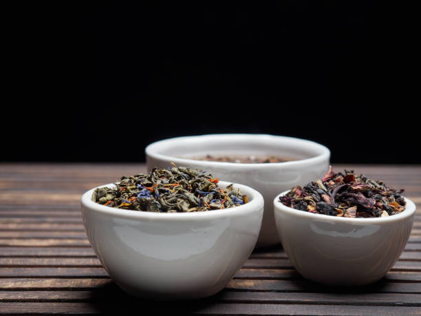 istock Tea of different kinds is poured into light cups. 868685844