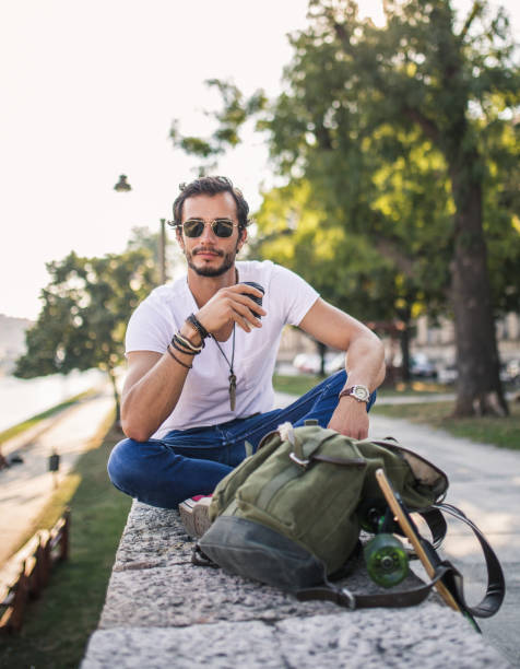 istock Skater man relaxing in park 868688288