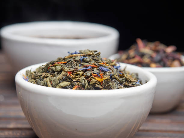 istock Tea of different kinds is poured into light cups. 868688430