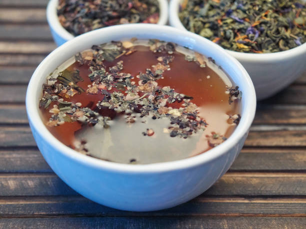 istock Tea of different kinds is poured into light cups. 868688734