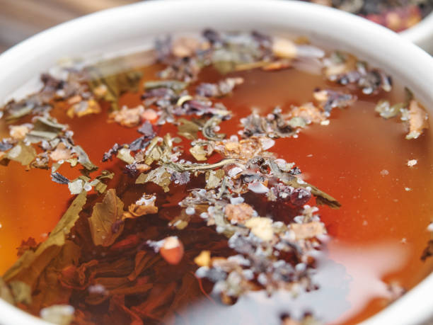 istock Tea of different kinds is poured into light cups. 868688854