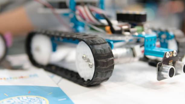 istock electronic robots close-up shallow focus. working in robotics laboratory. children building robots at robotics school 868692160