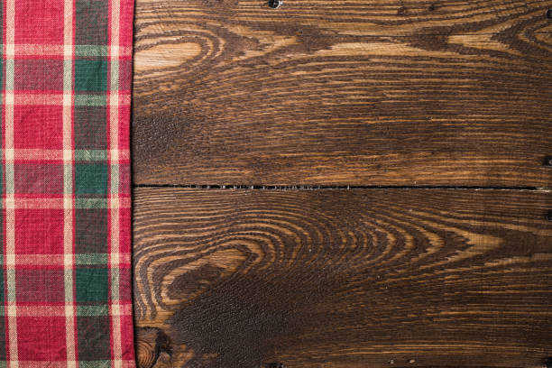 istock Rustic wooden boards with a red checkered tablecloth 868692496