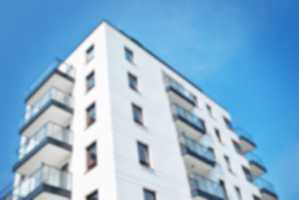 istock Abstract blur of modern apartment building. 868692710