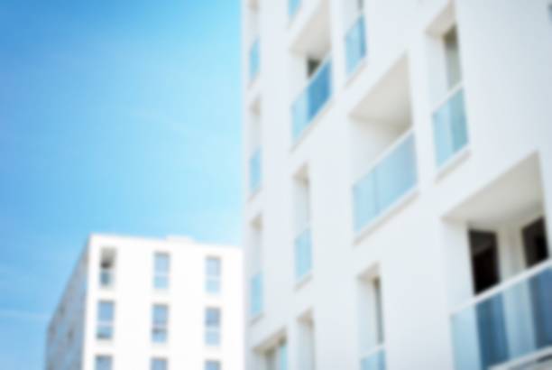 istock Abstract blur of modern apartment building. 868692864