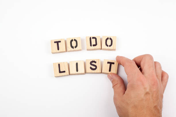 istock to do list. Wooden letters on a white background 868692978