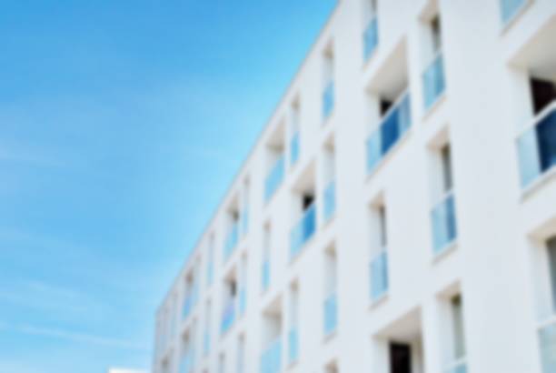 istock Abstract blur of modern apartment building. 868693018
